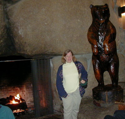 [ Karen by Lodge fireplace ]